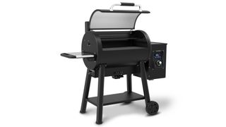 The broil king regal 500 BBQ shown with lid open on white background