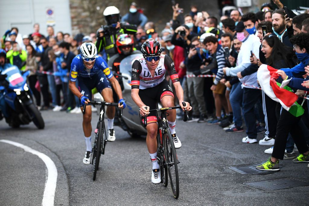 BERGAMO ITALY OCTOBER 09 LR Fausto Masnada of Italy and Team Deceuninck QuickStep and Tadej Pogacar of Slovenia and UAE Team Emirates compete in the breakaway while fans cheer during the 115th Il Lombardia 2021 a 239km race from Como to Bergamo ilombardia UCIWT on October 09 2021 in Bergamo Italy Photo by Tim de WaeleGetty Images
