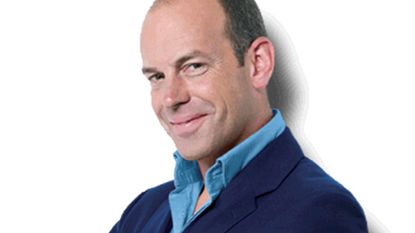 journalist martin lewis with blue coat and shirt