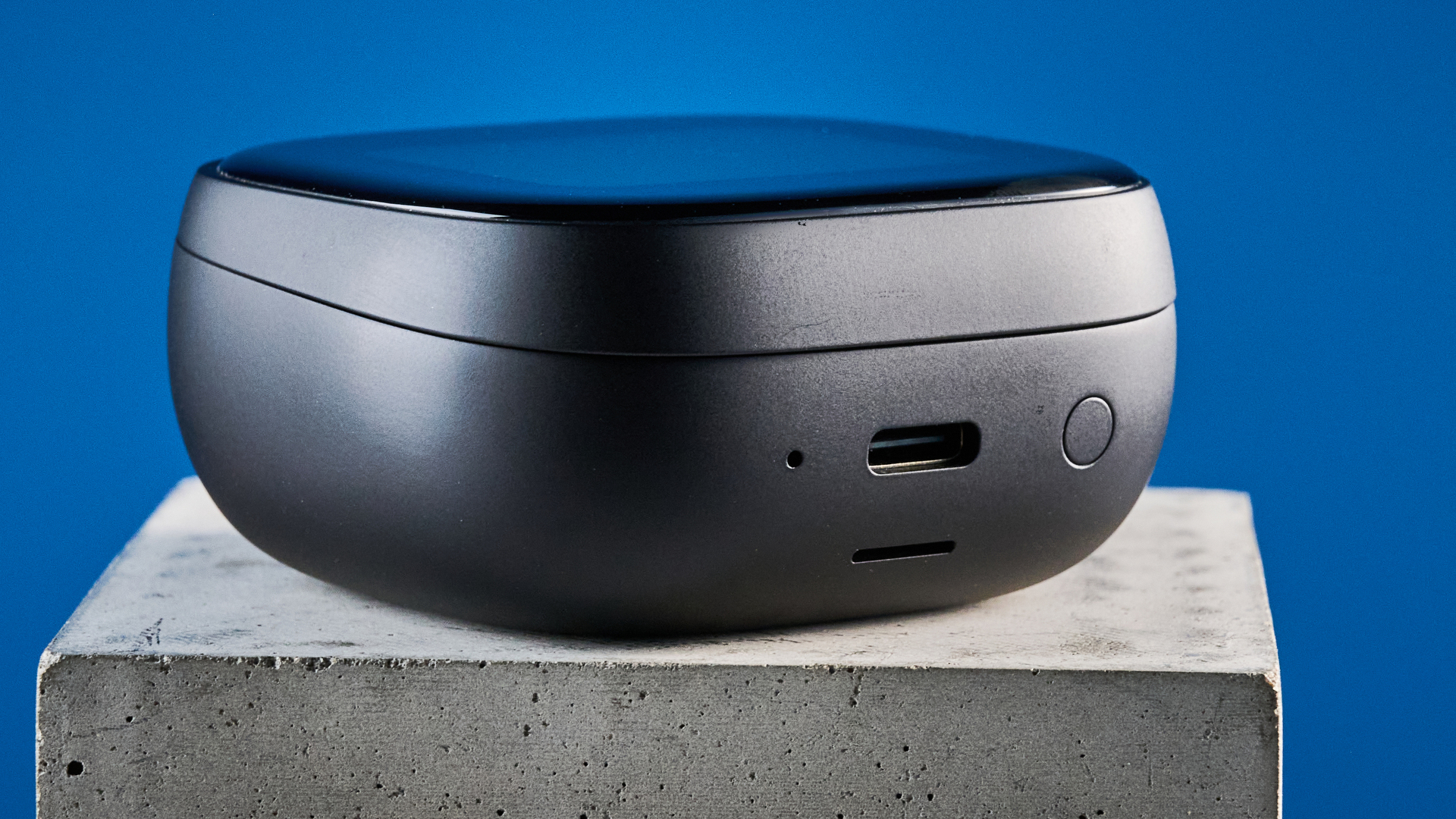 the soundcore liberty 5 pro max earbuds photographed against a blue tom's guide background