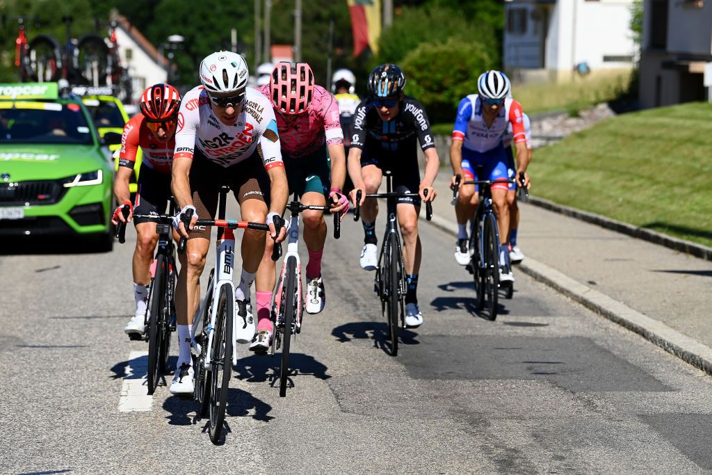 AESCH SWITZERLAND JUNE 13 LR Matthew Holmes of United Kingdom and Team Lotto Soudal Michael Schr of Switzerland and AG2R Citren Team Jonas Rutsch of Germany and Team EF Education Easypost compete in the breakaway during the 85th Tour de Suisse 2022 Stage 2 a 198km stage from Kusnacht to Aesch ourdesuisse2022 WorldTour on June 13 2022 in Aesch Switzerland Photo by Tim de WaeleGetty Images