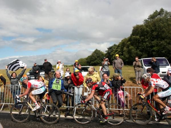 Cadel Evans (BMC) plays a waiting game behind Jurgen Van Den Broeck and ahead of Philippe Gilbert.
