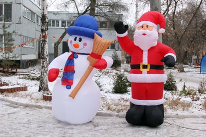 inflatable Santa outside house