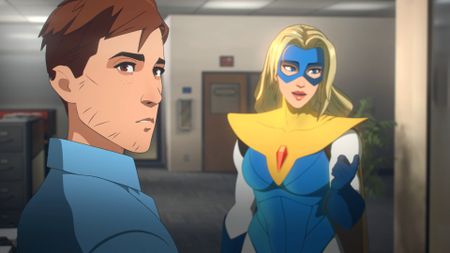 Robert, the protagonist of Dispatch, looks over his shoulder while in conversation with a superheroine.