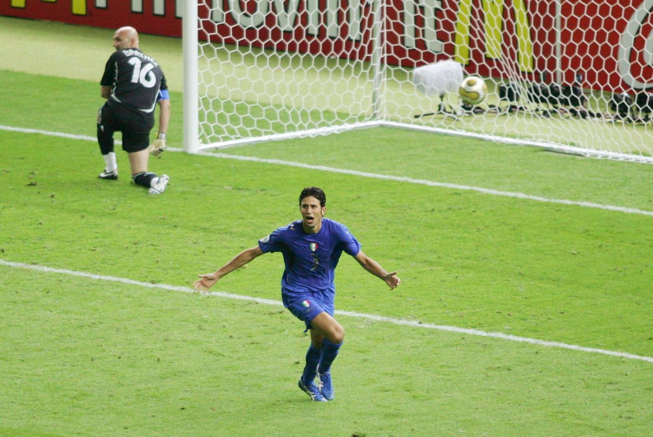 Fabio Grosso celebrates after scoring the winning penalty for Italy in the shootout in the 2006 World Cup final against France