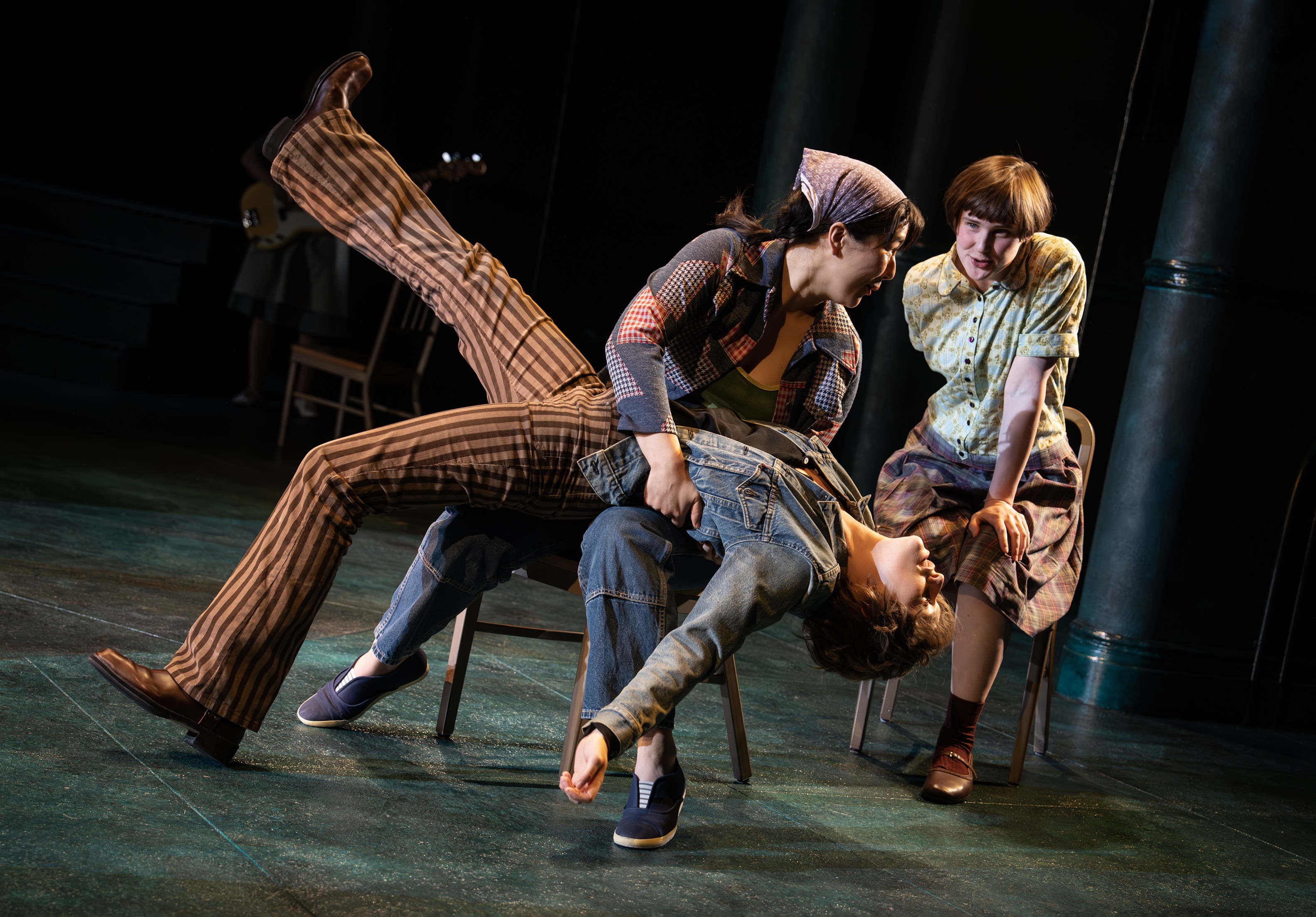 king princess as lisa in girl interrupted the musical as she leans back and one of her cast mates catches her