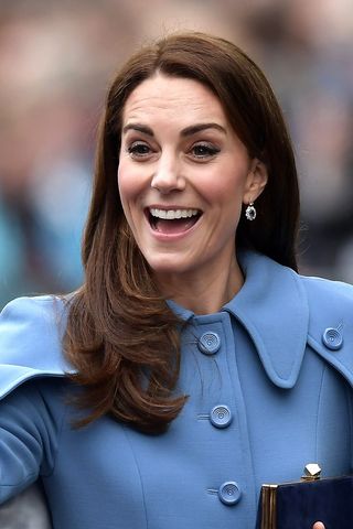 Kate Middleton headshot with a flikcy ends straight hairstyle