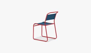 Tubular metal chair with red frame and blue seat and back