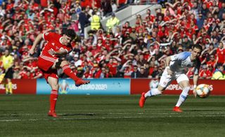 Daniel James scores his first senior goal for Wales against Slovakia at the Cardiff City Stadium