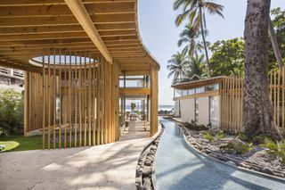 beachfront house al suave in el salvador showing indoor outdoor areas and swimming pools, and bamboo construction