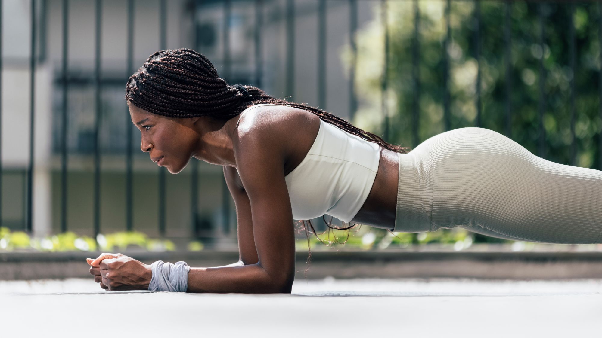 A woman doing a Copenhagen plank