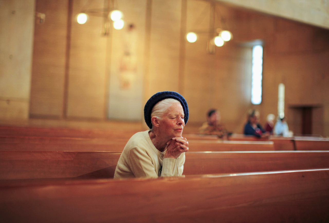 The faithful pray in a Los Angeles church.