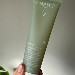 Laura holding Caudalie Vinopure Purifying Gel Cleanser - best cleansers