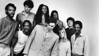 The Talking Heads take a group photo for Stop Making Sense.