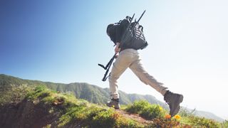 A man hiking through a trail