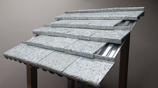 Silver coloured roof tiles made from plastic