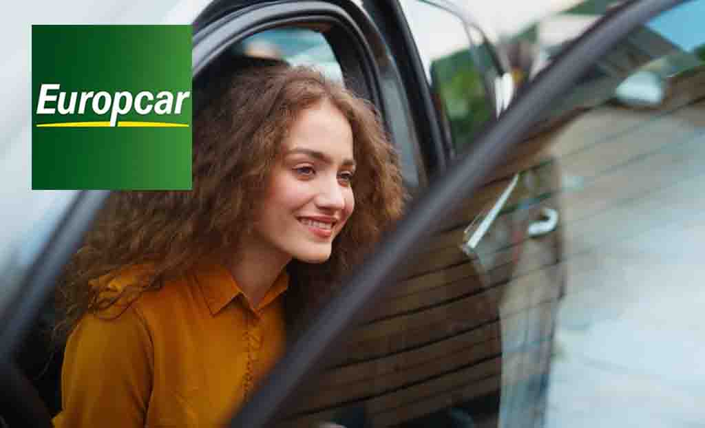 Europcar logo placed over a woman getting out of a car