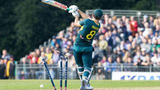 Australia's Mitchell Marsh is bowled out during a T20 International Series match between Scotland and Australia