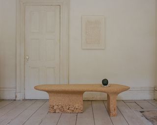 Cork table with black ceramic vase