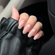 Zola Ganzorigt wearing OPI's Put It In Airplane Mode