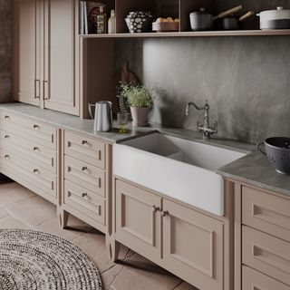 Pink kitchen with double belfast sink