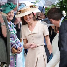 Princess Kate in a beige dress at Peter Phillips's wedding