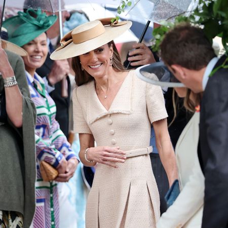 Princess Kate in a beige dress at Peter Phillips's wedding