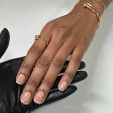 A glass French manicure