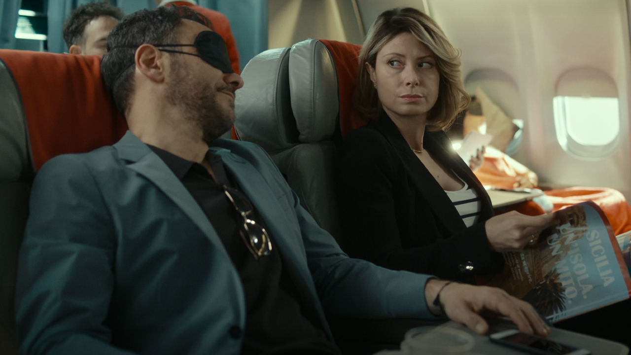 Euridice Axen and Massimiliano Gallo in The Players