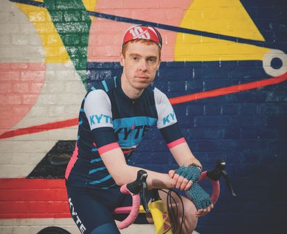 Cyclist Sam Gray with his bike