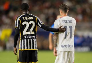 Tim Weah #22 of Juventus and Christian Pulisic #11 of AC Milan acknowledge one another during a game between AC Milan and Juventus at Dignity Health Sports Park on July 27, 2023 in Carson, California.