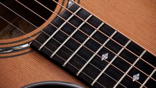 A detail photo of a Taylor Legacy 514CD Grand Auditorium acoustic guitar