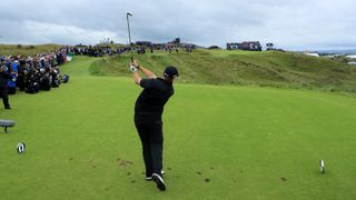 Shane Lowry of Ireland plays his tee shot on the 16th hole during the final round of the 148th Open Championship held on the Dunluce Links at Royal Portrush Golf Club