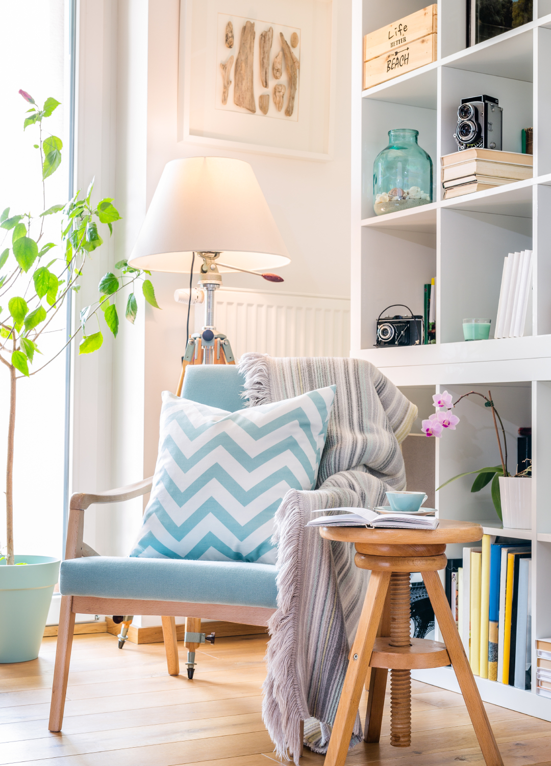 Pastel coloured library with a wool throw