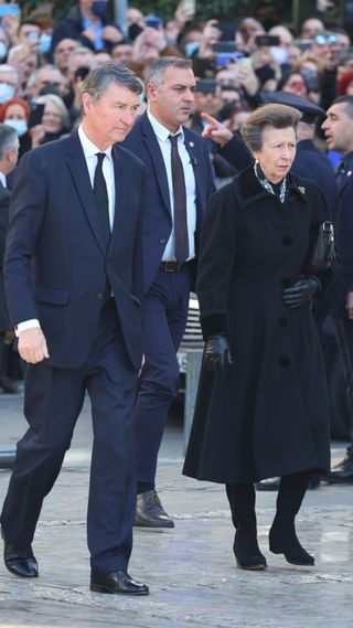 Princess Anne and Sir Timothy Laurence arrive for King Constantine of Greece's funeral