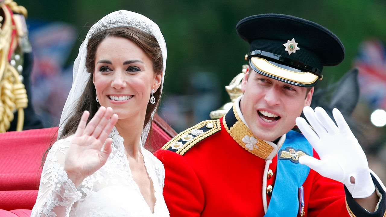 Kate Middleton rides in the carriage with Prince William on their wedding day in April 2011