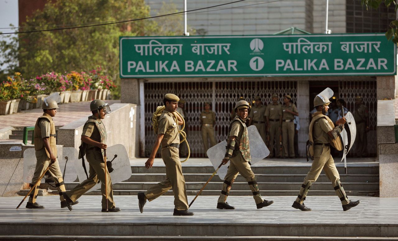 Riot policemen perform a mock drill in New Delhi, India, in 2009.