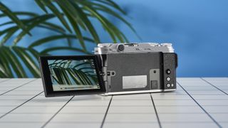 A Fujifilm X-M5 mirrorless vlogging camera in the silver colorway