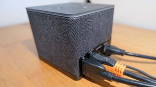 The Fire TV Cube (2022) from behind, with most of its ports full.