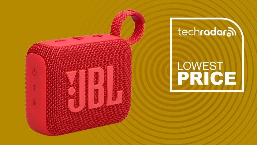JBL Go 4 Portable Bluetooth Speaker in red on yellow background with TechRadar lowest price text