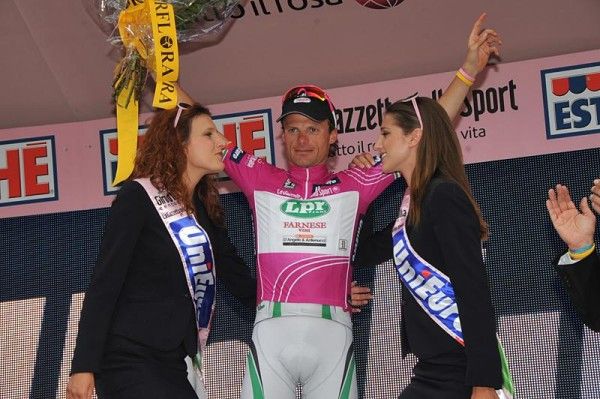 Danilo Di Luca still gets podium time by leading the points classification.