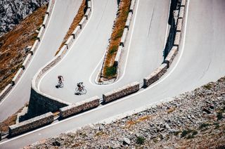 Two riders on the Stelvio climb