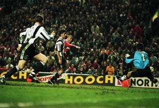 Stan Collymore scores for Liverpool against Newcastle