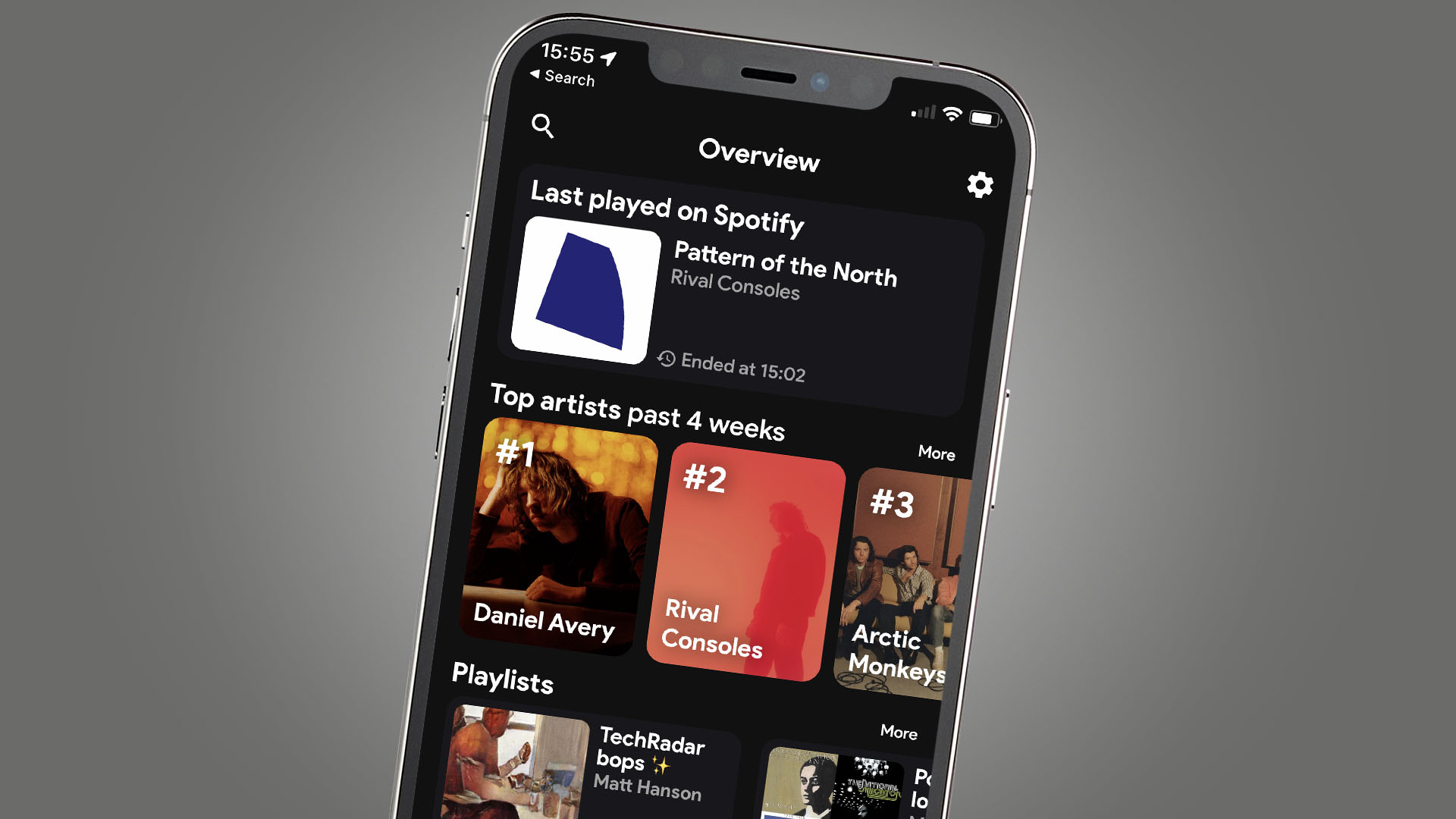 A phone showing the Stats.fm app for Spotify