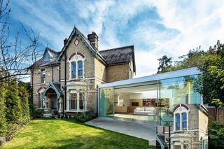 victorian house with contemporary single storey glass extension