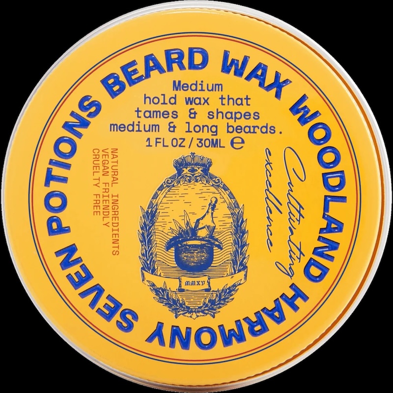 Seven Potions beard wax in a yellow tin 