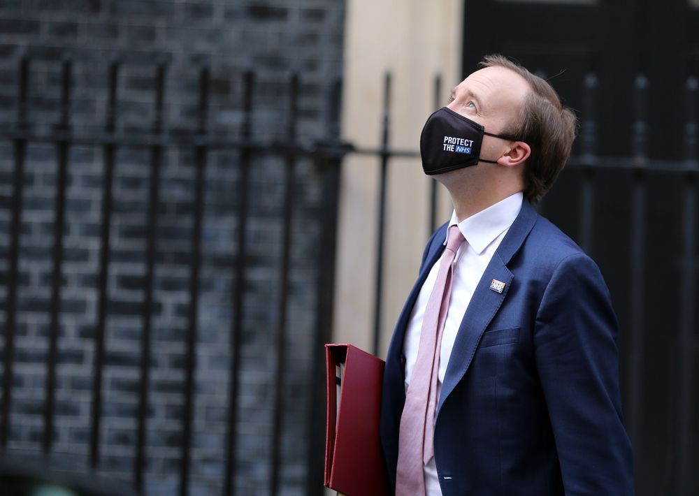 Former health secretary Matt Hancock looks up to the sky