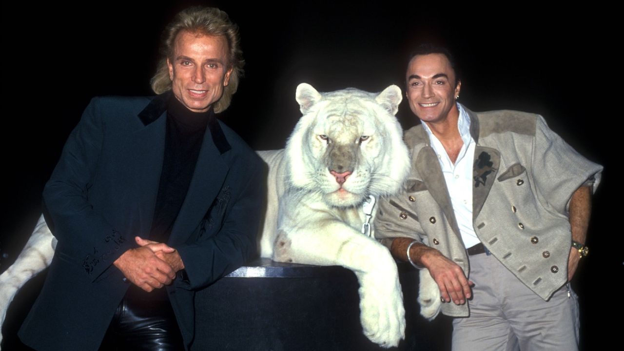 Siegfried &amp;amp; Roy and one of their Royal Snow White Tigers