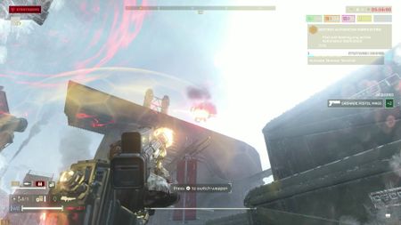 Helldivers 2 helldiver charging up quasar cannon to fire at automaton gunship flying in the air
