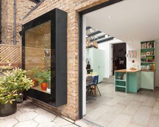 Small addition ideas - glass box window on the back of a terraced house